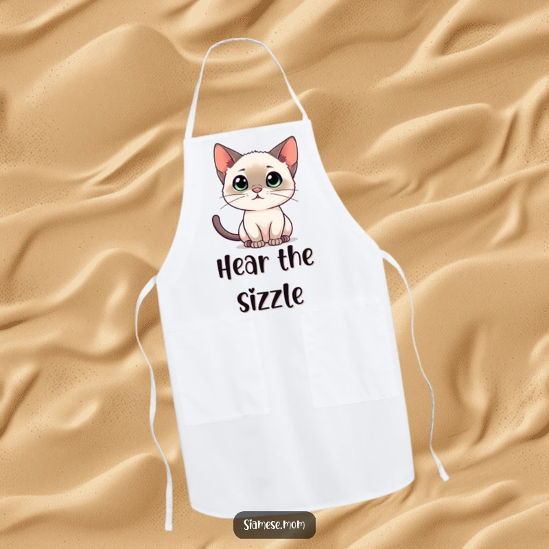 Funny Siamese cat apron, depicting intense listening, great for adding focus and flair to kitchen tasks.