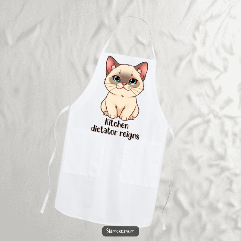 Funny Kawaii Siamese cat apron showing a smug, pampered cat overseeing kitchen duties, blending humor and royalty.