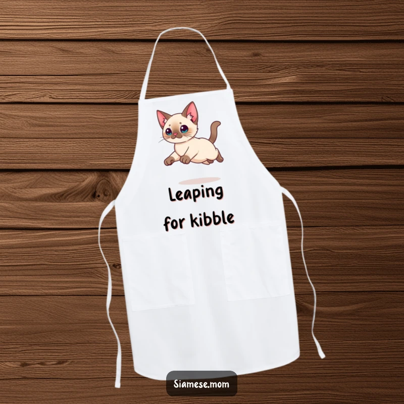 Funny Kawaii Siamese cat apron showing a graceful leap with tucked legs, adding humor and charm to kitchen activities.