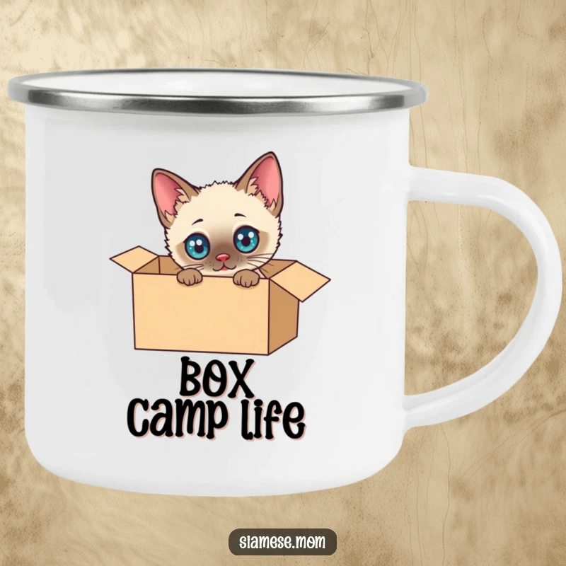 Funny Siamese Cat Camping Mug: Cute kawaii cat peeking from a cardboard box, ideal for outdoor adventures and daily use, full of humor.