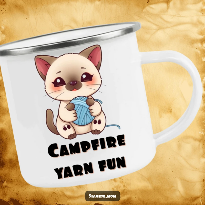 Funny camping mug featuring a kawaii Siamese cat playing with a ball of yarn, designed for outdoor enjoyment and cat lover humor.