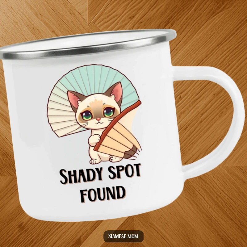 Funny Siamese Cat Camping Mug: A playful Siamese cat hides behind a fan, bringing humor to your outdoor adventures.