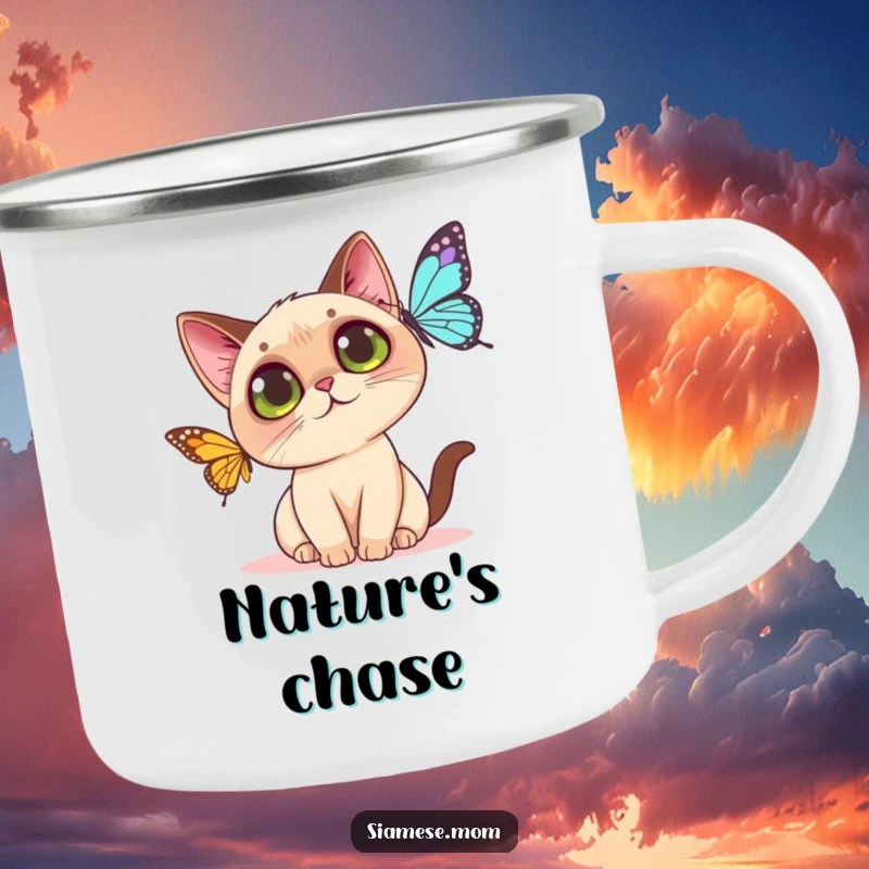 Funny Kawaii Siamese cat camping mug showing a curious big-eyed cat trying to catch a butterfly, ready for adventure.
