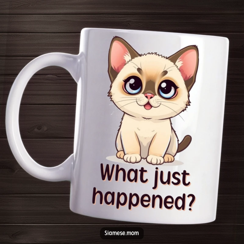 Funny Surprise Mug: A kawaii Siamese kitten with huge, round, surprised blue eyes looking directly at the viewer.