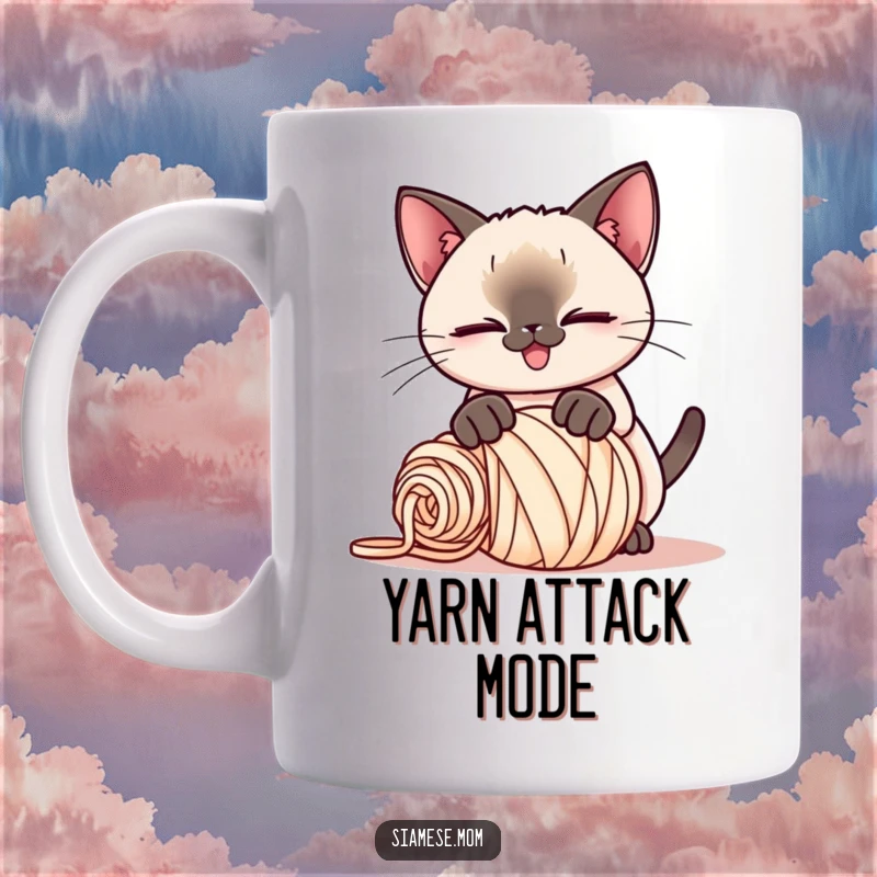 Funny Kawaii Siamese cat mug, playful smirk, pouncing on a rolled-up ball of yarn, capturing a moment of feline mischief.