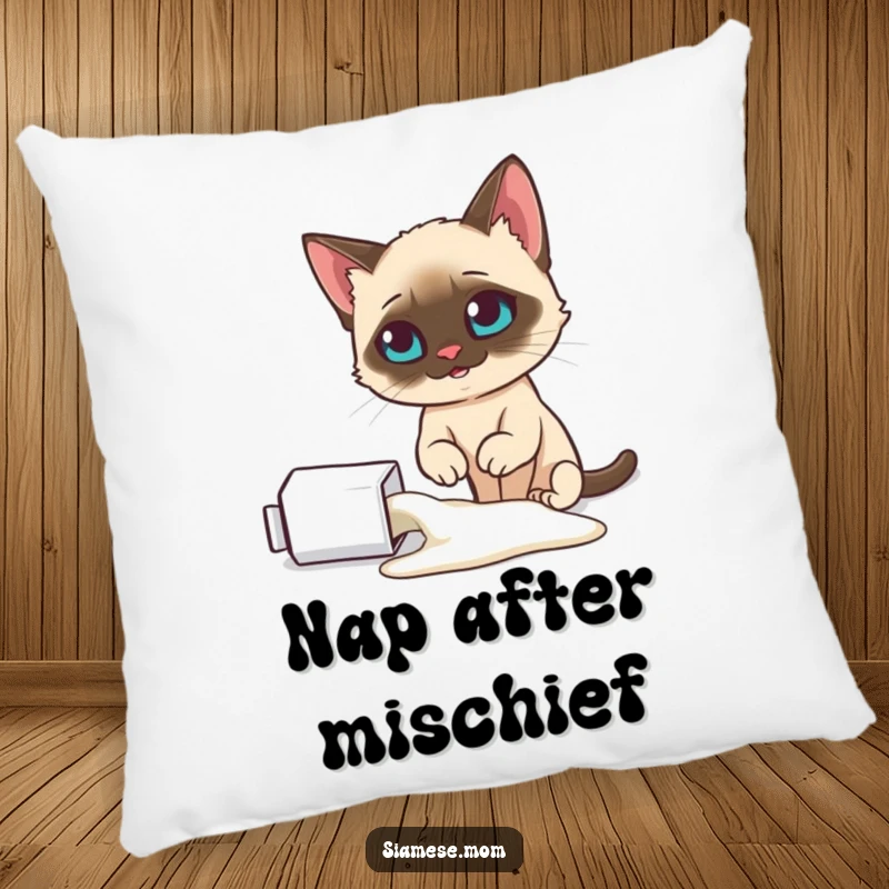 Funny Siamese cat pillow, looking smugly at a spilled milk carton, offering cozy humor, a delightful funny gift.
