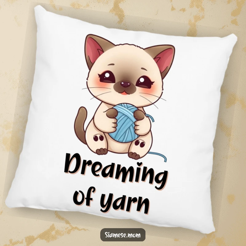 Funny pillow featuring a kawaii Siamese cat playing with a ball of yarn, offering soft comfort and adorable charm.