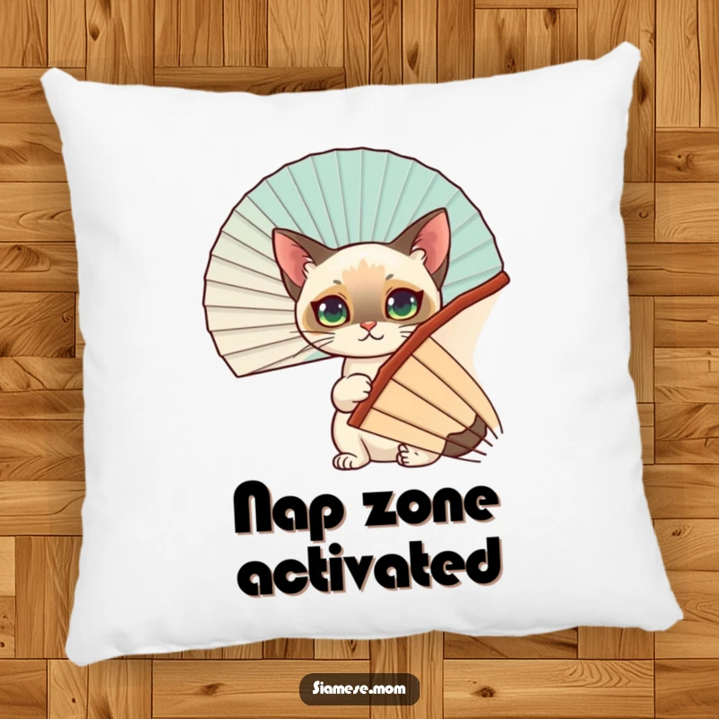 Funny Siamese Cat Pillow: A cute Siamese cat uses a decorative fan for a funny hiding place, perfect for cozying up.