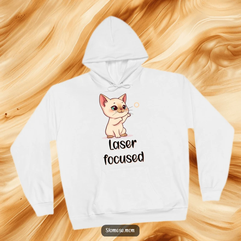 Funny Siamese Cat Hoodie, cat batting at a projected laser dot, energetic and cozy funny gift.