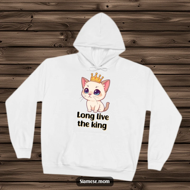 Funny Siamese cat illustration wearing a miniature golden crown, looking sophisticated on a warm hoodie, ideal for a funny gift.