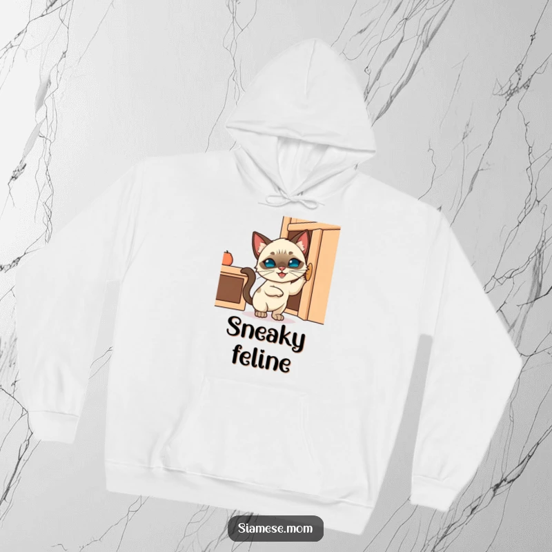 Funny hoodie illustrating a cute Kawaii Siamese cat with a mischievous grin attempting to open a cabinet door, perfect for cat lovers.