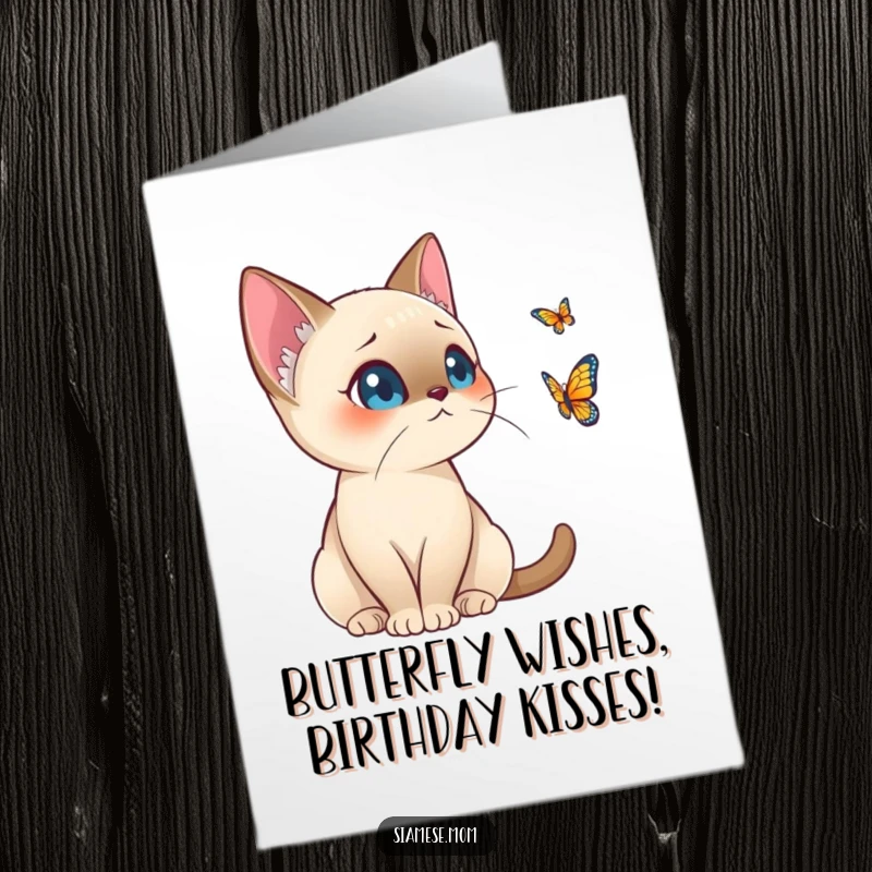 Funny Free Printable Birthday Card: Kawaii Siamese cat poised alertly, mid-chase of a distant butterfly, ready for a birthday surprise.