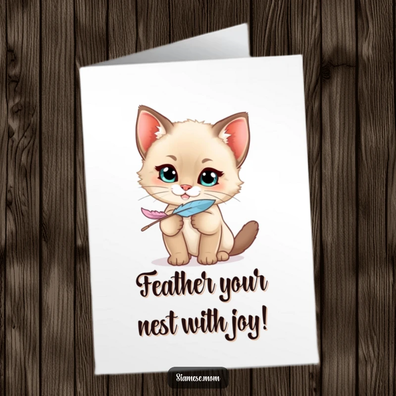 Funny Free Printable birthday card: A kawaii Siamese kitten with a mischievous grin playfully holds a feather, ready for birthday antics.