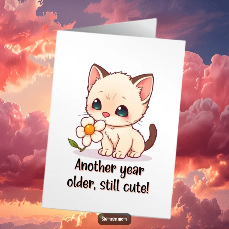 Funny Free Printable Birthday Card: Kawaii Siamese kitten with big eyes curiously sniffing a bright flower.
