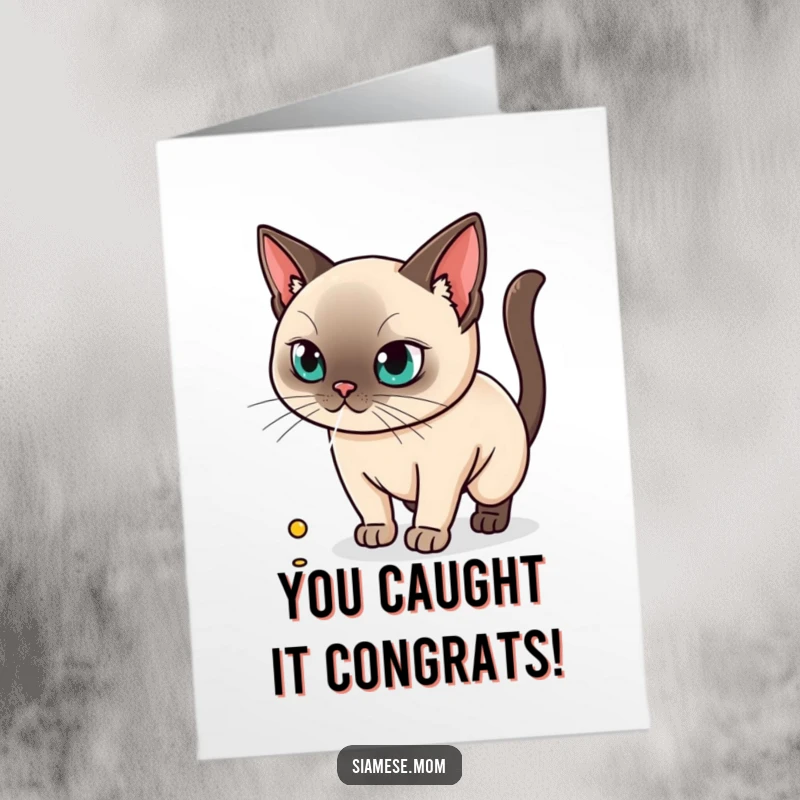 Funny Free Printable Kawaii Siamese Cat Congratulations Card, intently chasing a laser dot, a downloadable gift of victory.