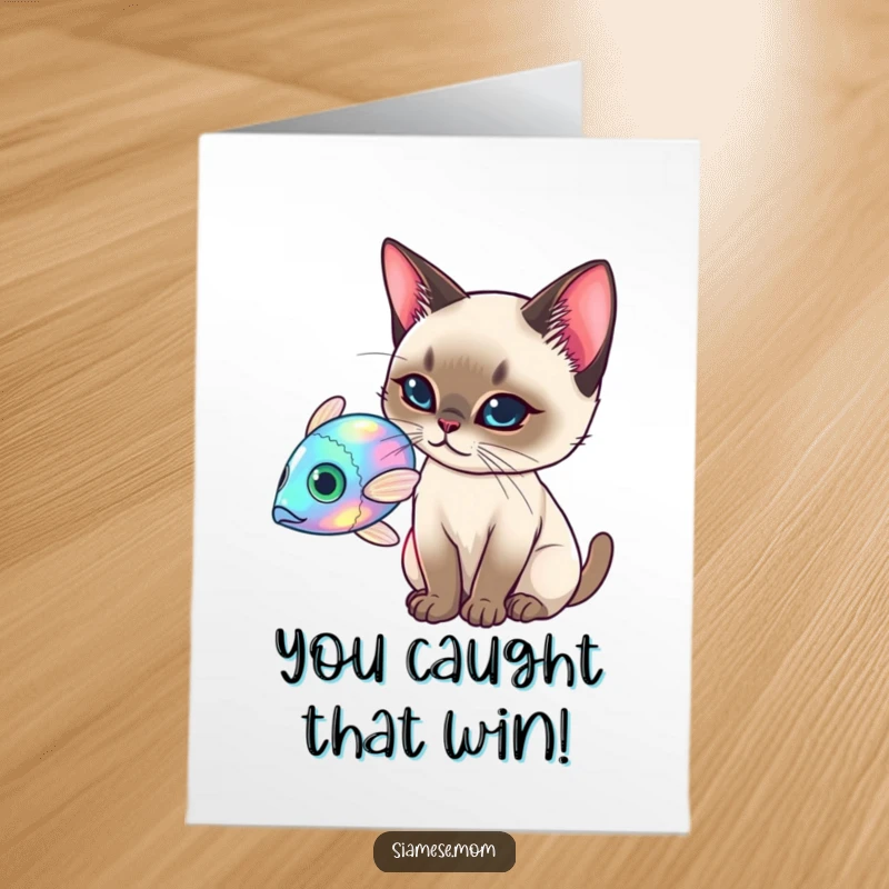 Funny Free Printable Congratulations Card: An elegant Siamese cat batting at a shimmering holographic fish, congratulating achievement.