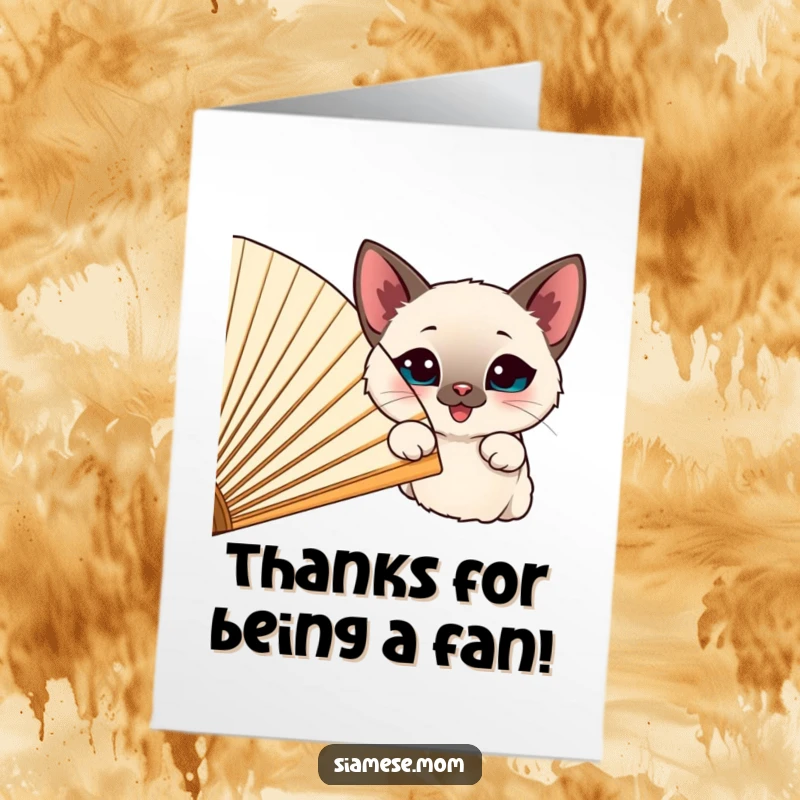 Funny Free Printable Thank You Card: a happy Siamese cat peeks amusingly from behind a large, festive fan.