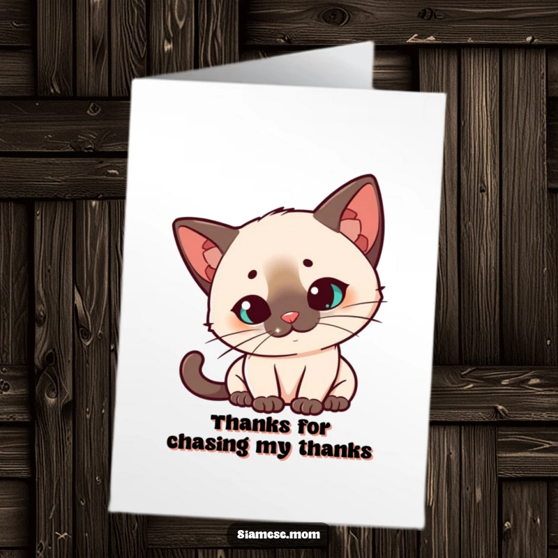 Funny Free Printable Thank You Card: Kawaii Siamese cat with head tilted quizzically, watching a laser dot, showing curious thanks.