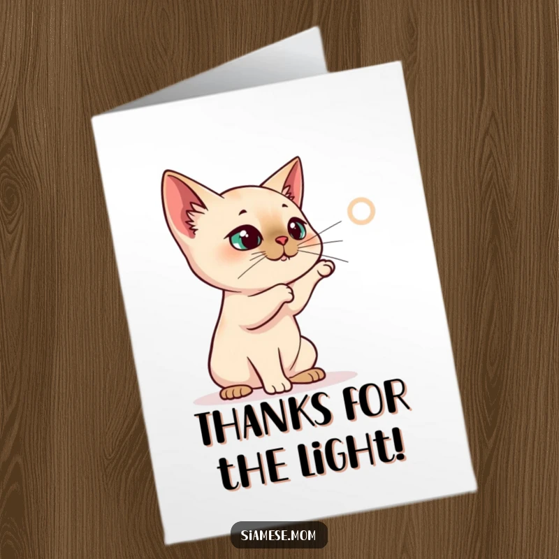 Funny Free Printable Thank You Card: A Siamese cat character batting at a projected red laser dot, expressing thanks with energy.