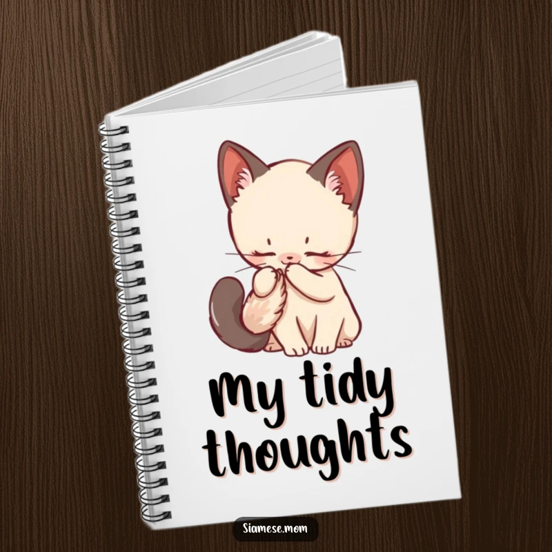 Funny Siamese Kitten Notebook showcasing a kawaii cat grooming its fluffy tail, ideal for jotting down neat and tidy notes.