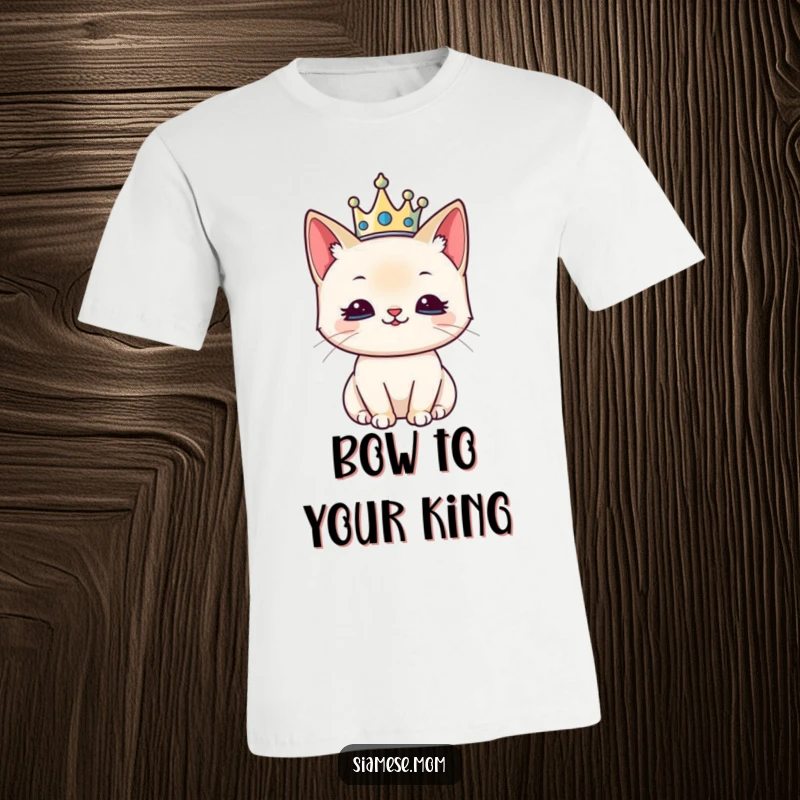 Funny t-shirt graphic of a kawaii Siamese cat wearing a tiny crown, looking regal and very pleased with itself.