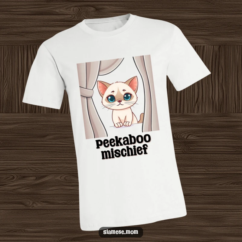 Funny Siamese Cat T-Shirt: Adorable kawaii cat with a sly smirk, peeking from behind a curtain, embodying playful mischief.
